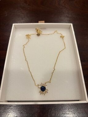 Gold-Plated Necklace with Navy Blue Sunburst Pendant